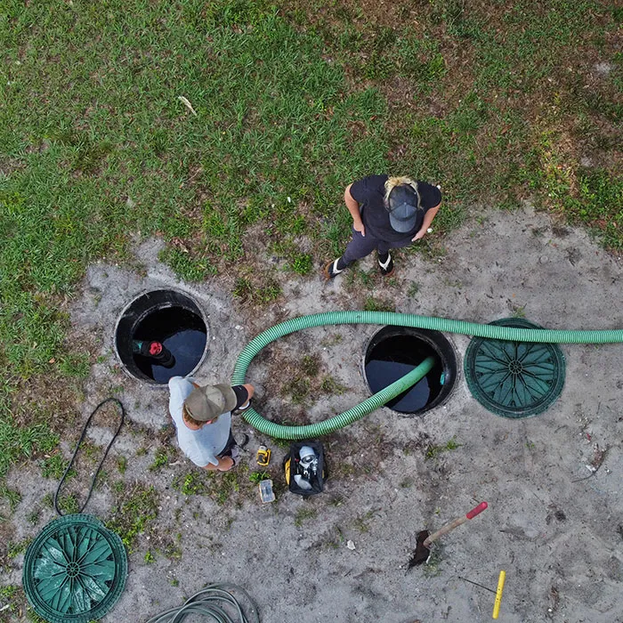 Septic service truck working at a rural mountain home in Western North Carolina