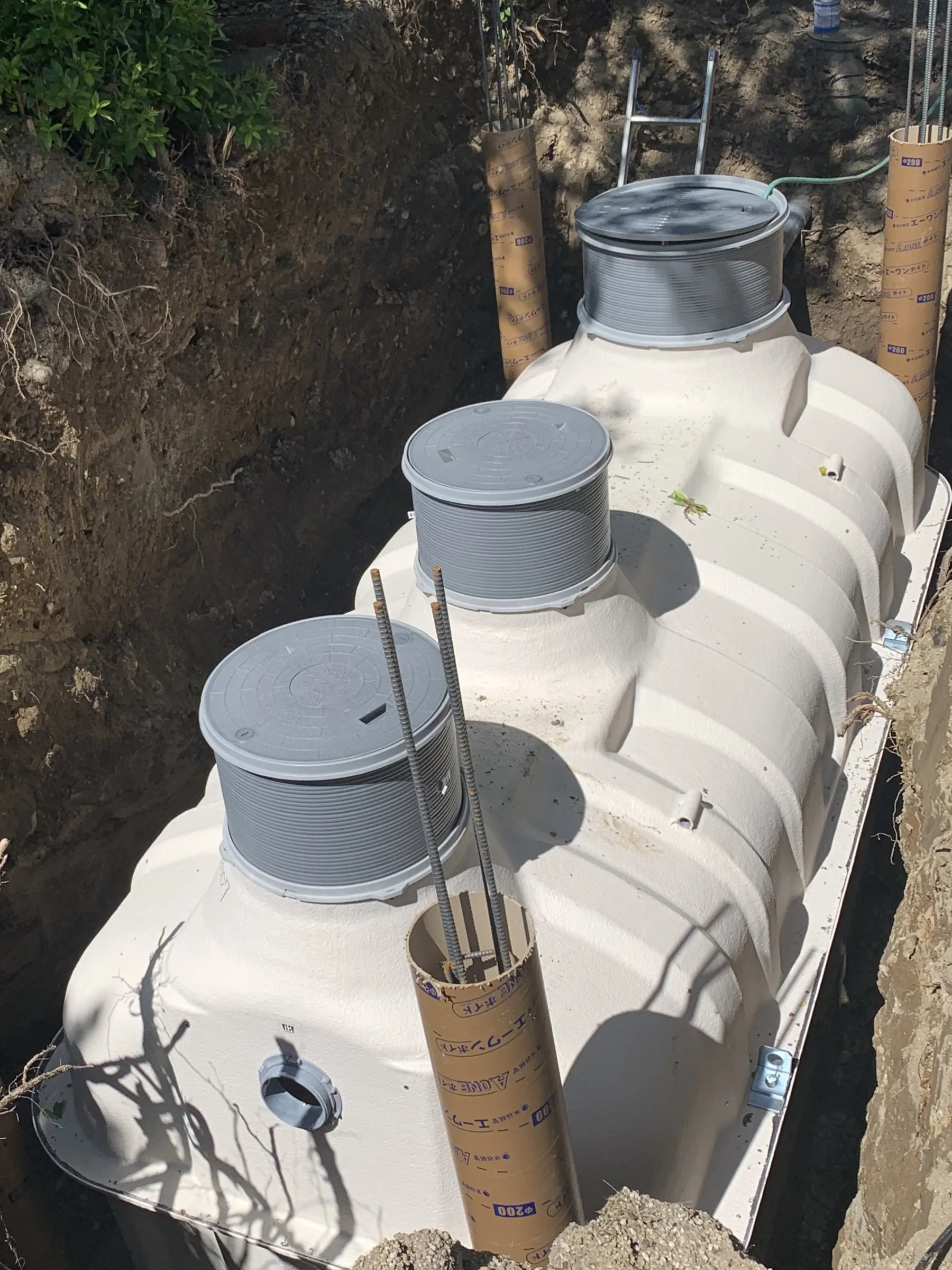 Septic system components being repaired at a home in Western North Carolina